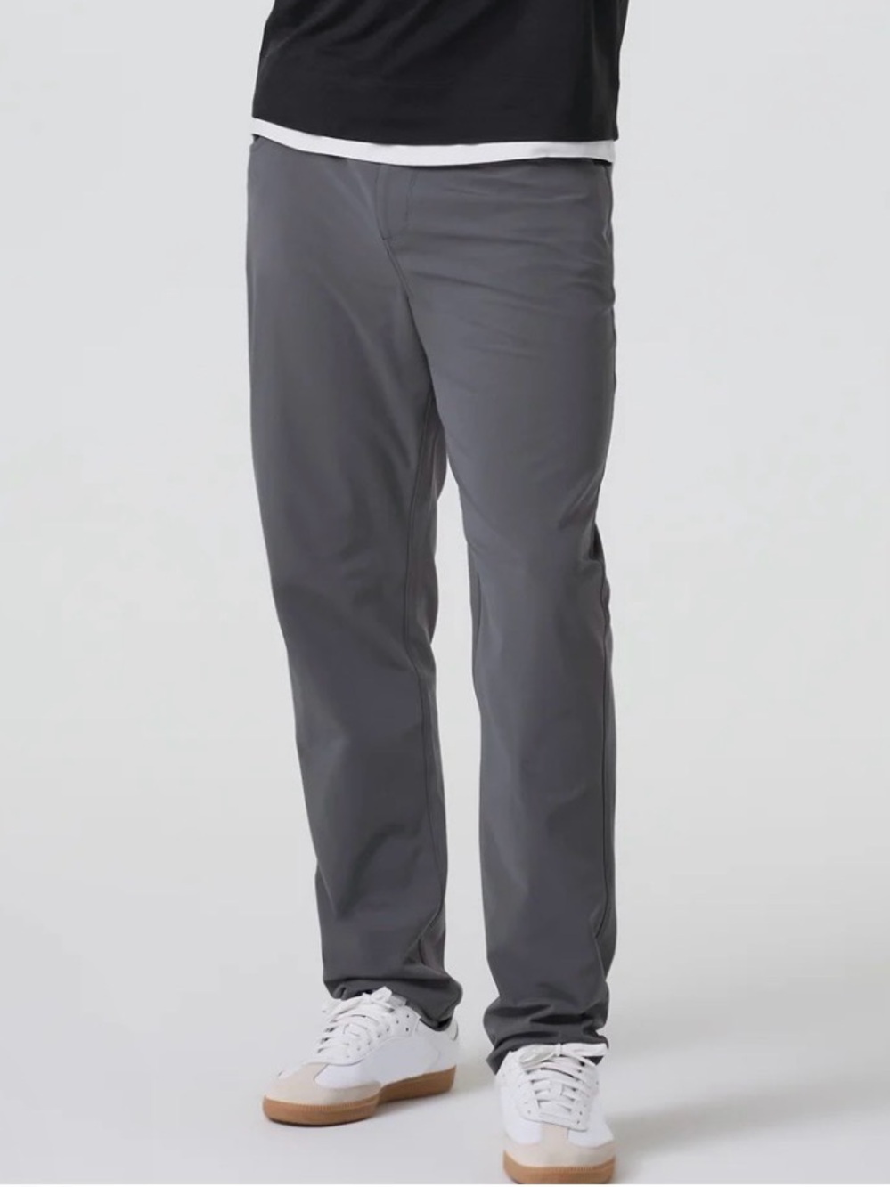 Vuori Men's Aim Pant in the "Concrete" heather grey colorway. Golf or Office 😎